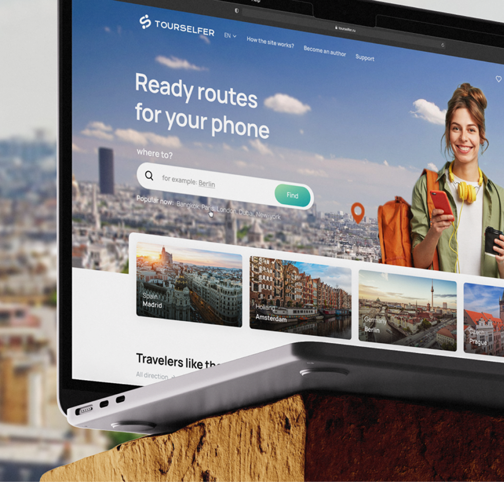 Stylized blue and pink image of a whiskey glass with the wordmark of Vèloce in pink all-caps letters above.